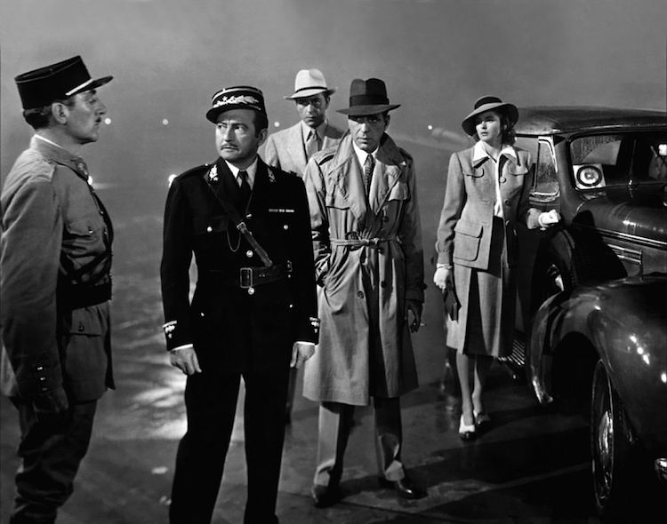 Humphrey Bogart, Paul Henreid, Claude Rains and Ingrid Bergman film Casablanca homme trench
