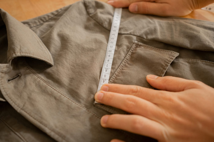 mesure poche veste avec mètre ruban